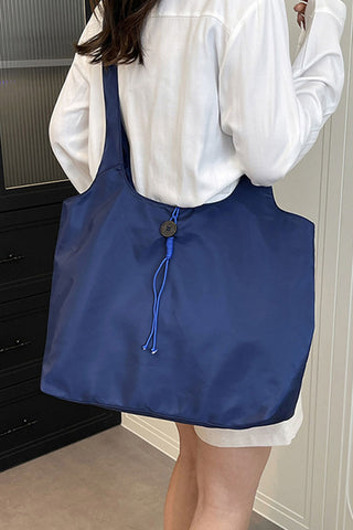 Grommet Side Button Tote Bag