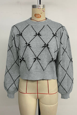 Bow-Accented Diamond Pattern Sweater