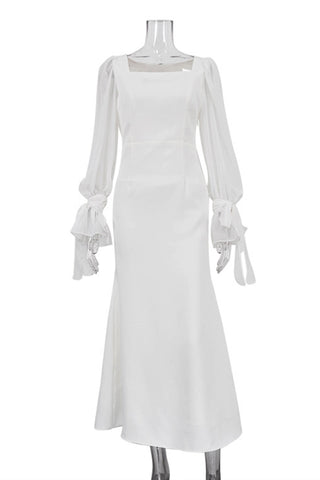 Elegant Dress with Tie Sleeve Detail