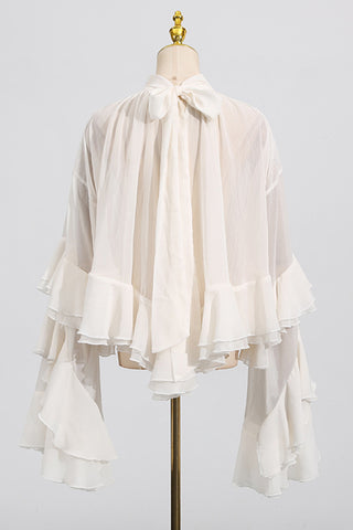 Flowing Ruffle Blouse with Dramatic Sleeves