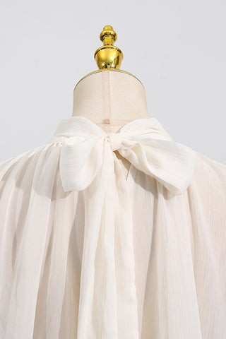 Flowing Ruffle Blouse with Dramatic Sleeves