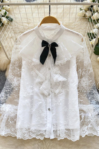 Elegant Ruffled Blouse with Bow Accent
