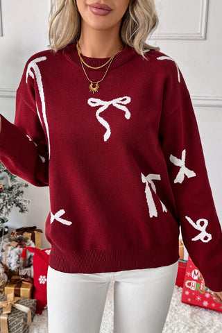 Festive Bow-Patterned Sweater