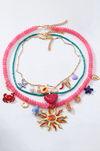 Multi-Charm Layered Statement Necklace