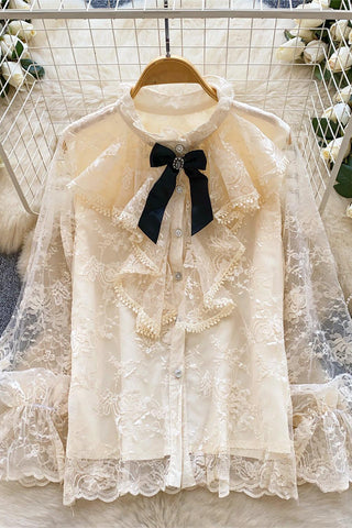 Elegant Ruffled Blouse with Bow Accent