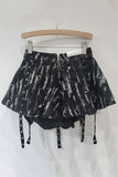 Edgy Belted Mini Skirt with Eyelet Detailing