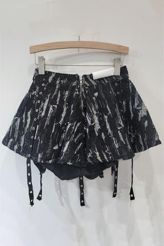 Edgy Belted Mini Skirt with Eyelet Detailing