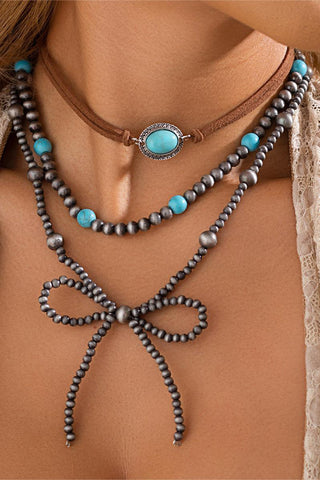 Elegant Beaded Bow Necklace