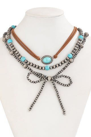 Elegant Beaded Bow Necklace