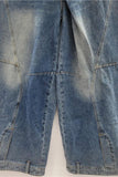 Wide-Leg Denim Trousers with Unique Details