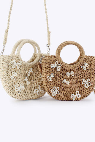 Elegant Woven Handbag with Bow Details