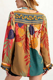 Patterned Blouse with V-Neck Detail