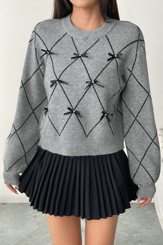 Bow-Accented Diamond Pattern Sweater