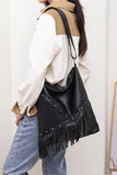 Fringe Accented Sling Bag