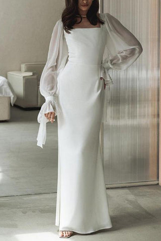Elegant Dress with Tie Sleeve Detail