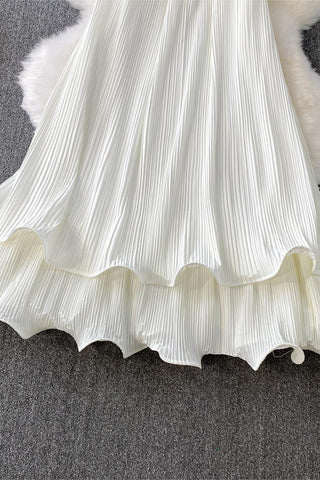 Flowing Pleated Halter Dress