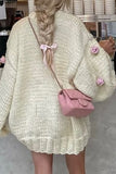 Oversized Knit Sweater with Floral Details