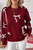 Festive Bow-Patterned Sweater