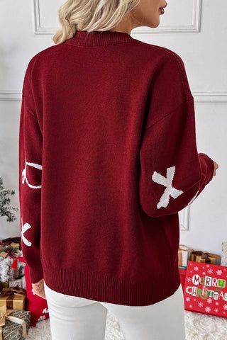 Festive Bow-Patterned Sweater