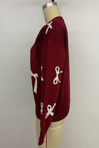 Festive Bow-Patterned Sweater