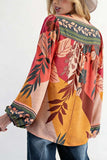 Patterned Blouse with V-Neck Detail
