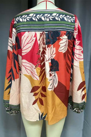 Patterned Blouse with V-Neck Detail