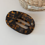 Marble Tortoiseshell Oval Snap Hair Clip