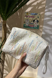 Embellished Textured Tassel Cosmetic Bag