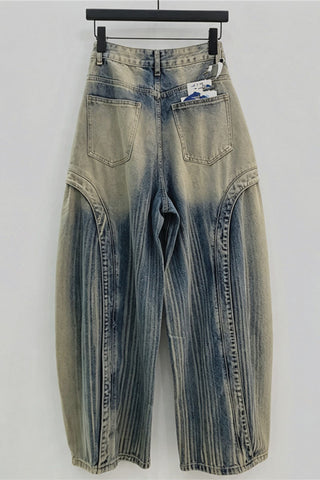 Studded Patchwork Distressed Barrel Jeans
